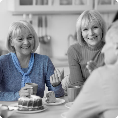 two women talking to an advisor