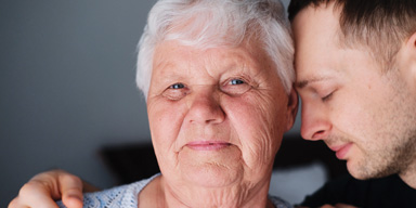 Elderly woman and son